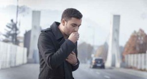 Man coughing