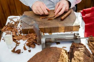 Man making cigars